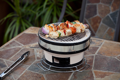 23.5'' Ocelot Outdoor Base Revolver Fire Pit With Wooden Top